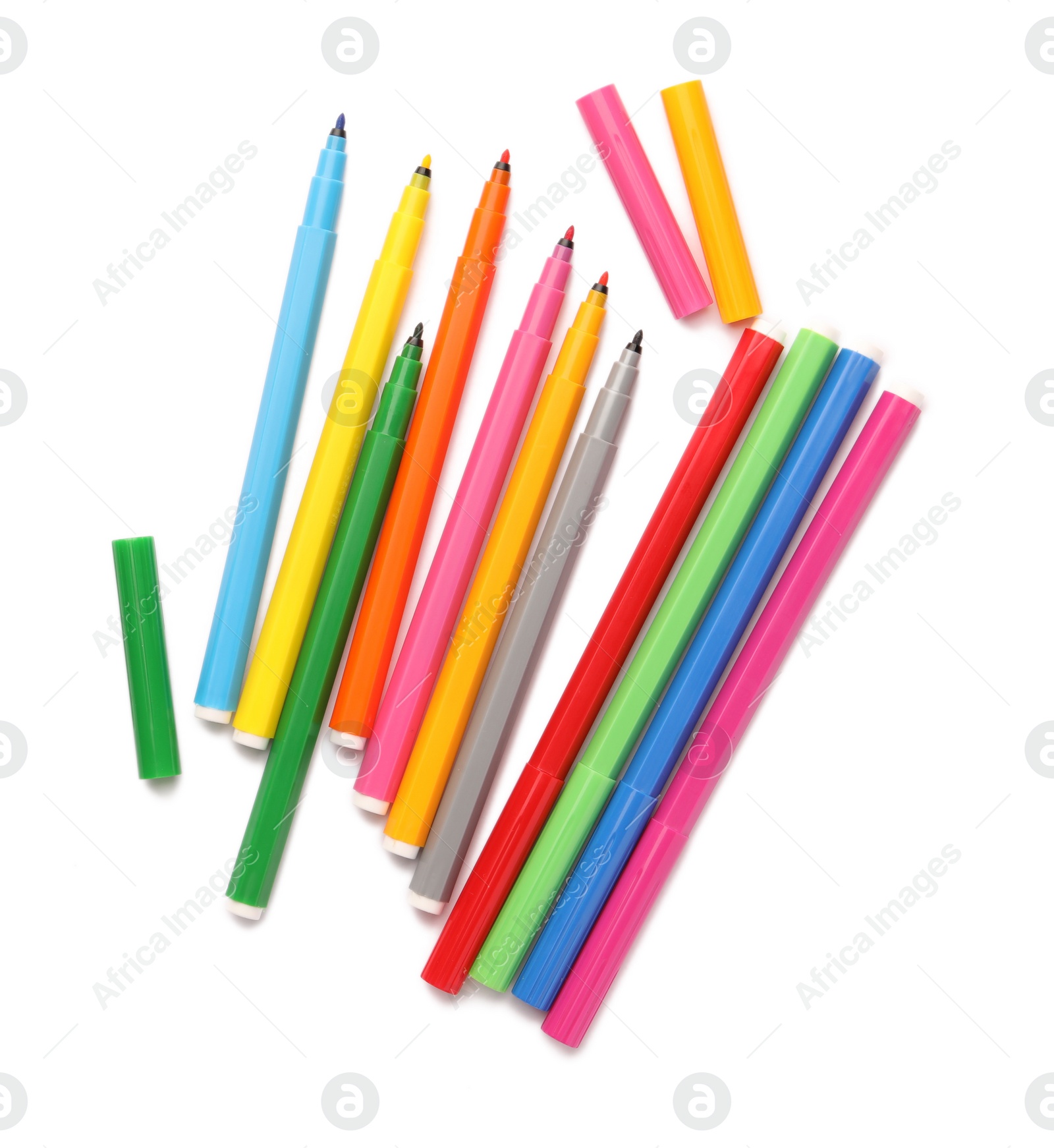 Photo of Many bright markers isolated on white, top view