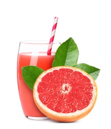 Image of Glass of grapefruit juice, fresh fruit and green leaves on white background