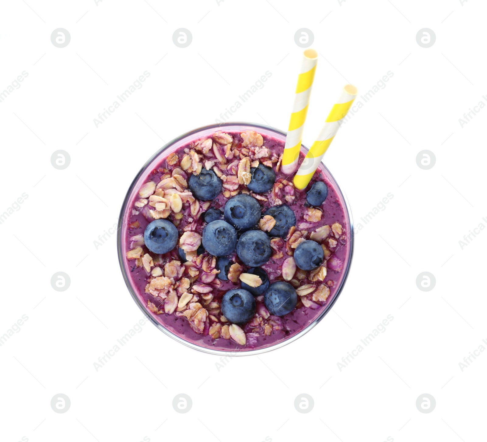 Photo of Glass of delicious blueberry smoothie with granola on white background, top view