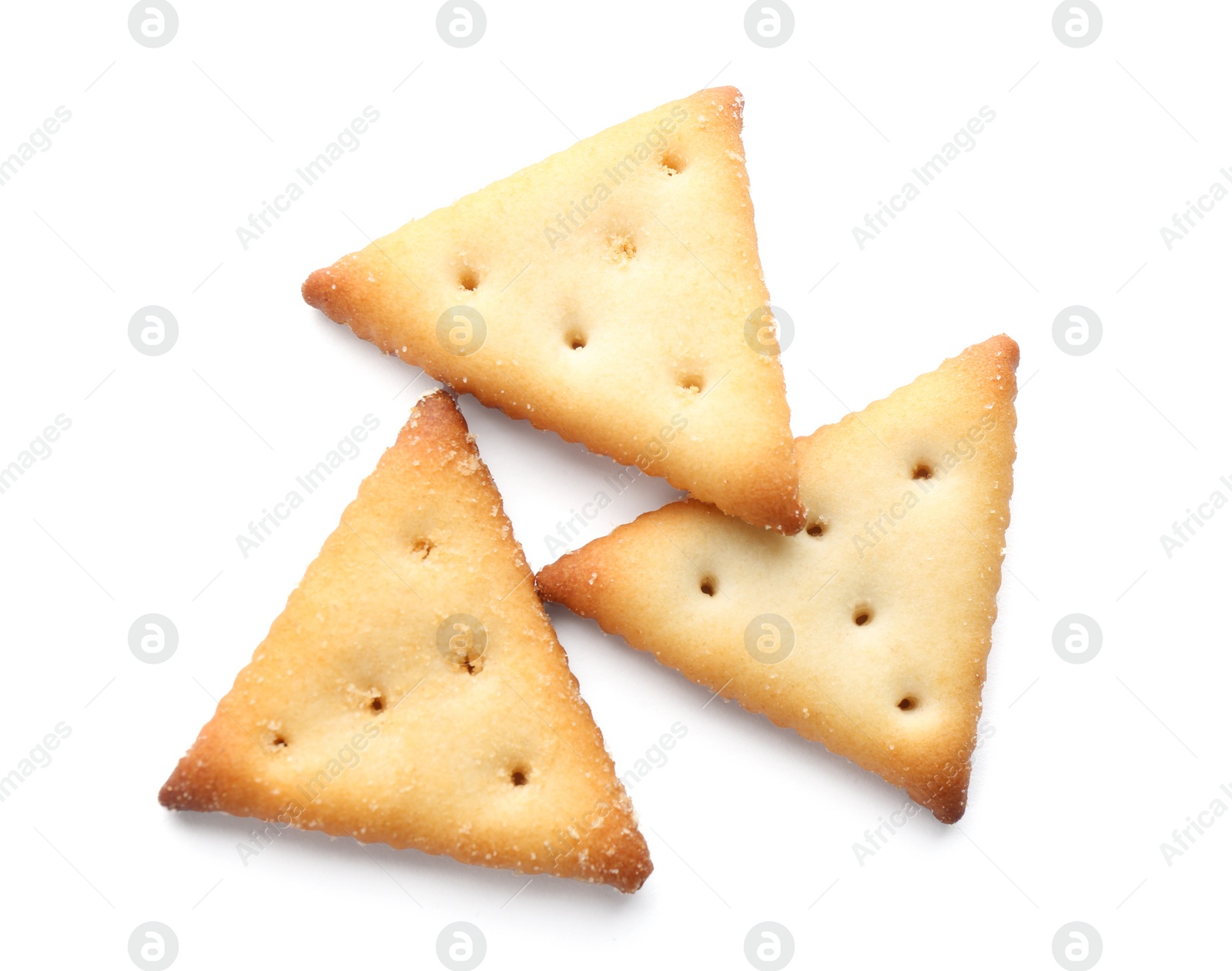 Photo of Delicious crispy crackers isolated on white, top view