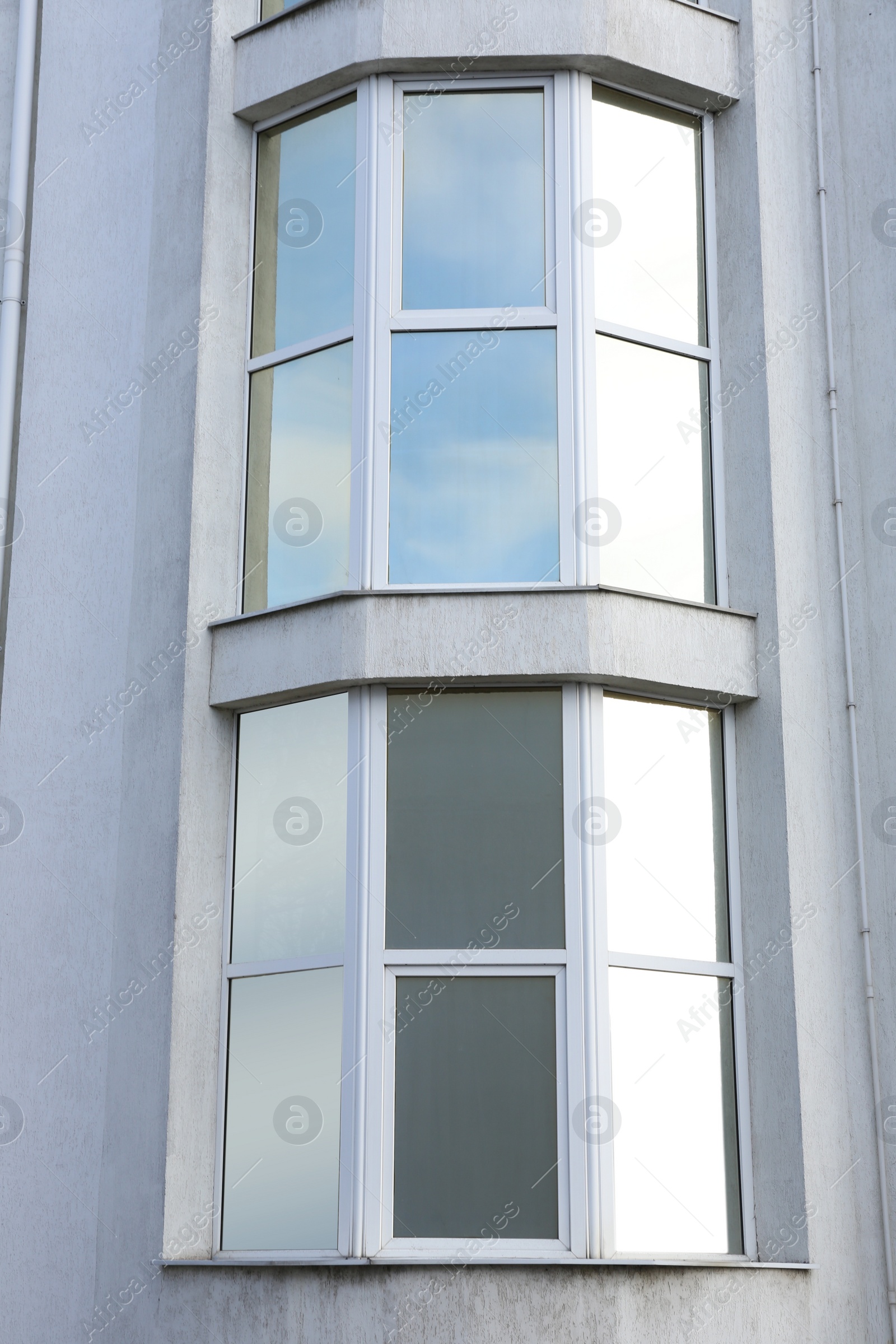 Photo of Modern office building with tinted windows. Urban architecture