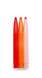 Different colorful markers on white background, top view