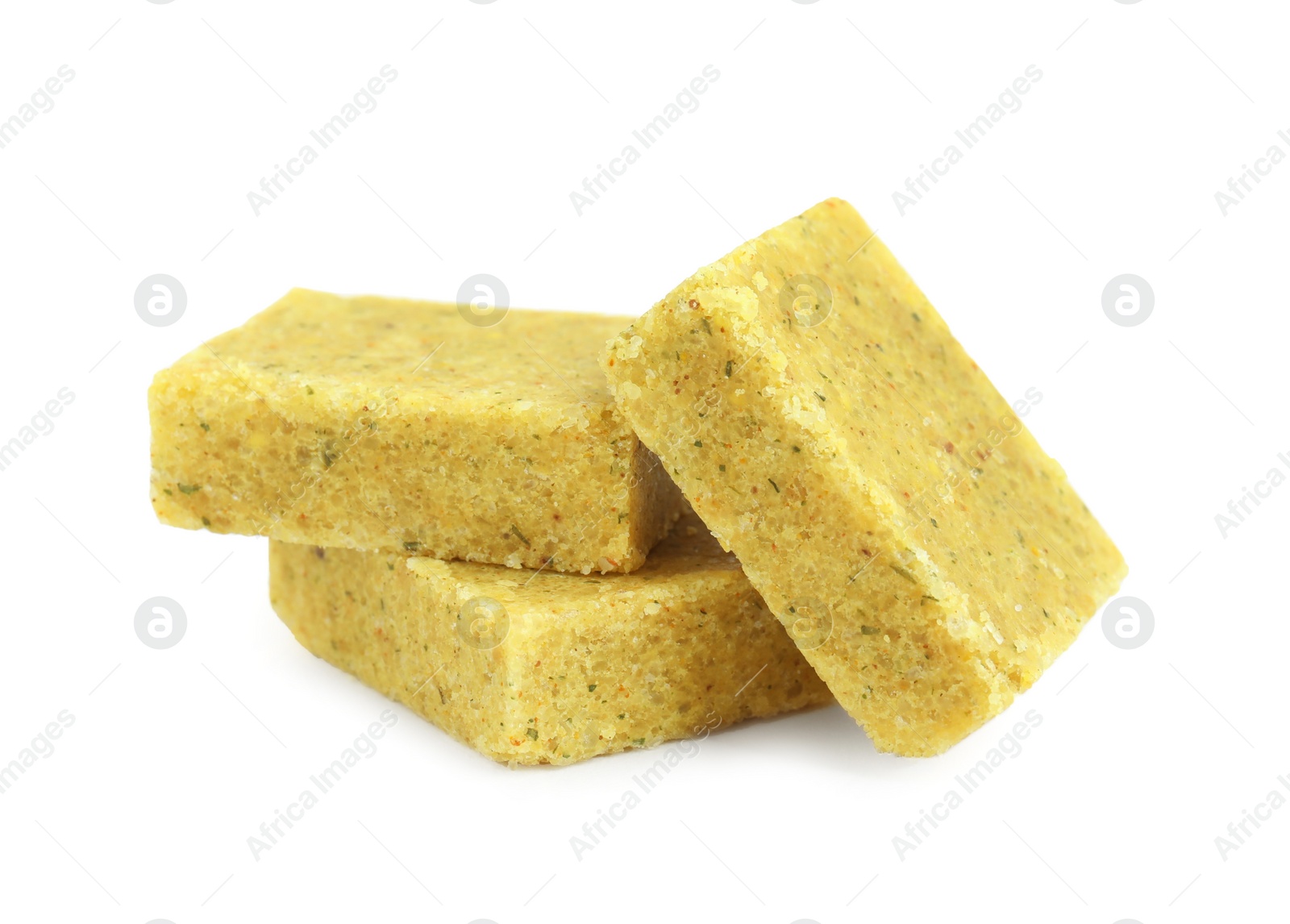 Photo of Bouillon cubes on white background. Broth concentrate