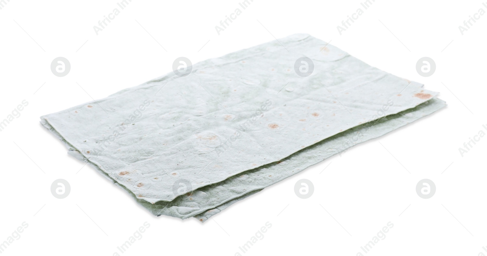 Photo of Delicious green folded Armenian lavash on white background