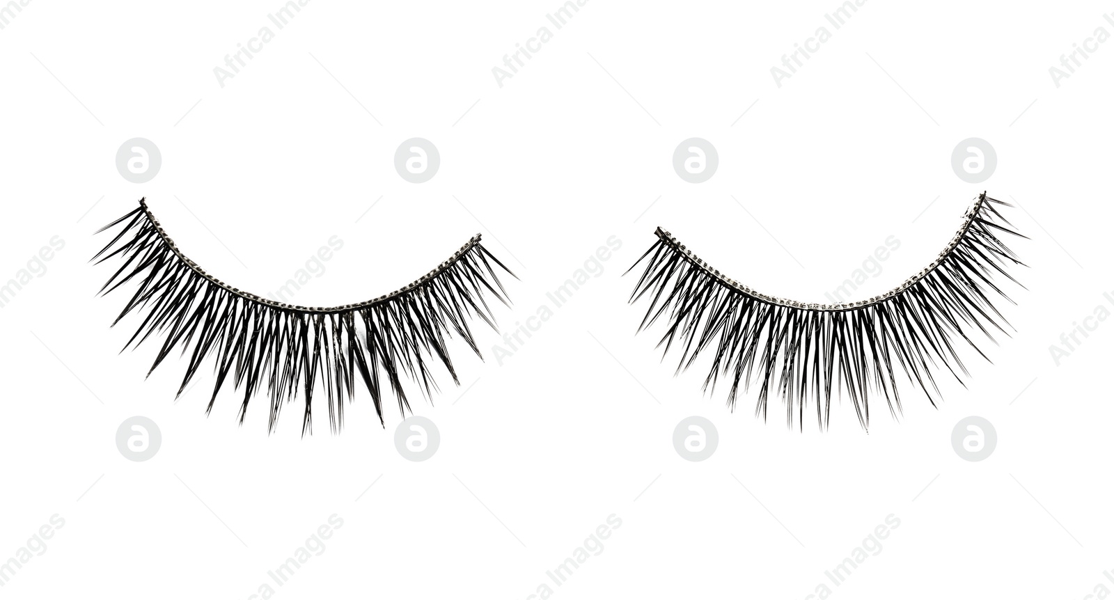 Photo of False eyelashes on white background