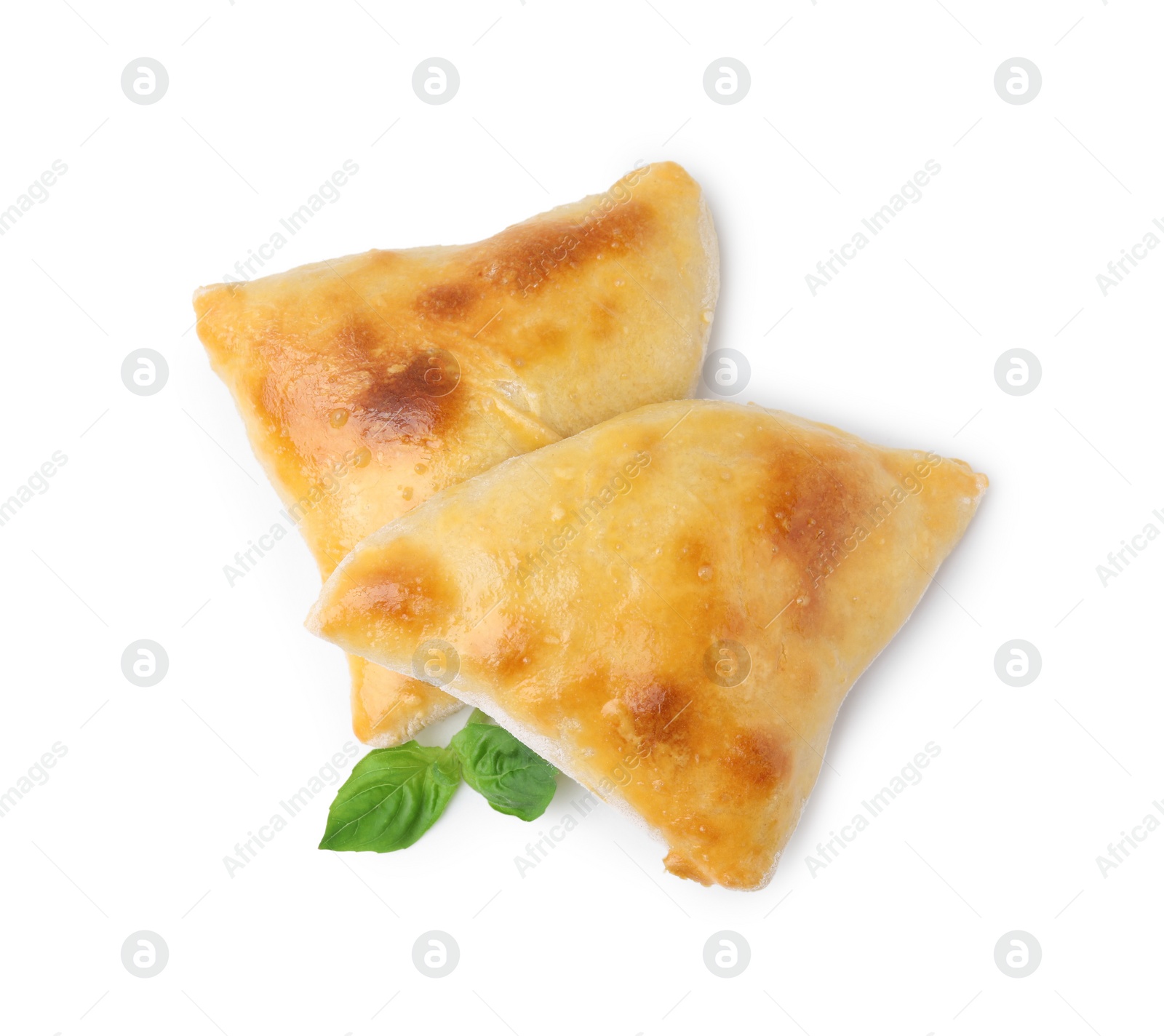 Photo of Delicious samosas and basil isolated on white, top view