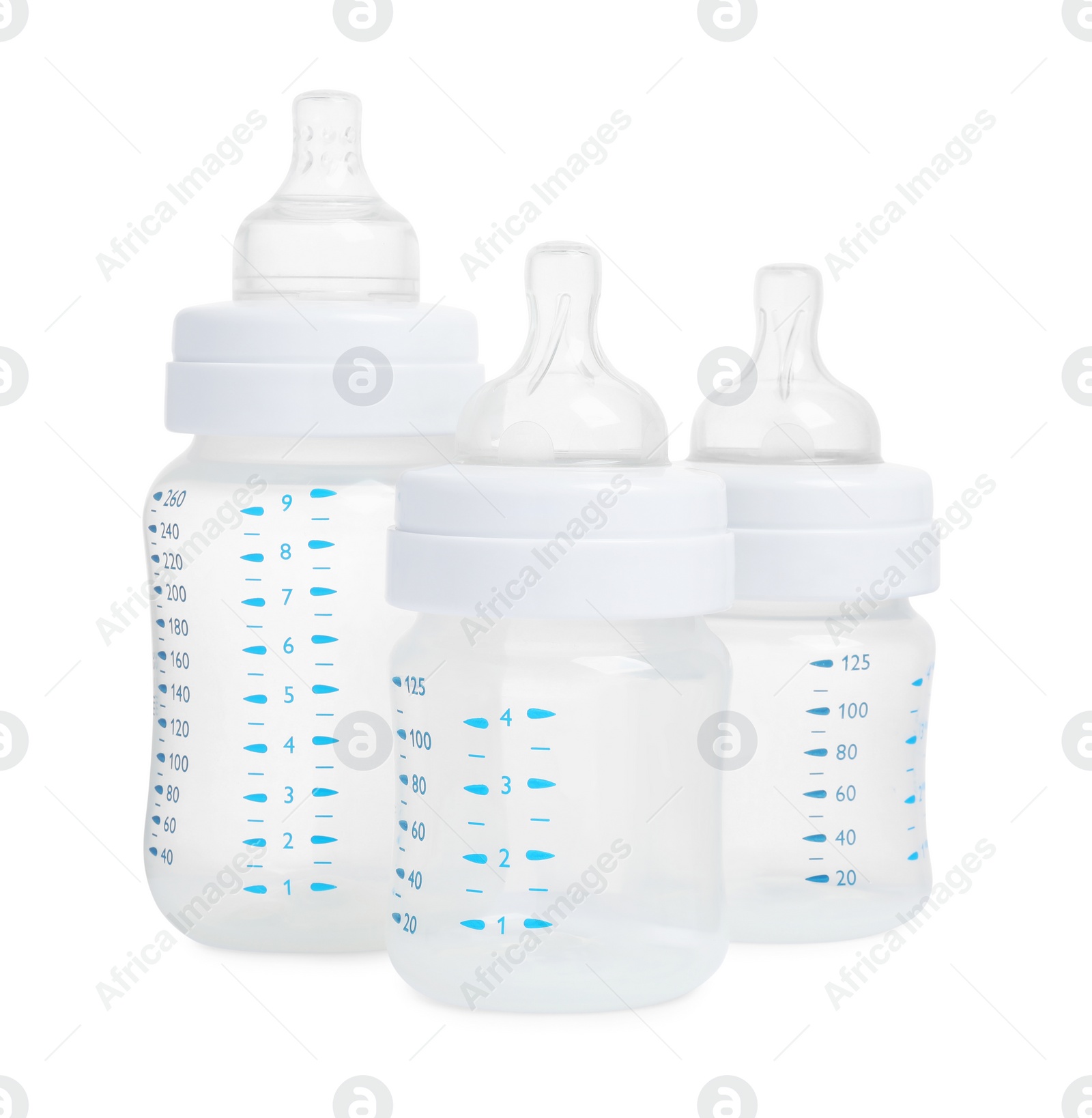 Photo of Three empty feeding bottles for baby milk on white background