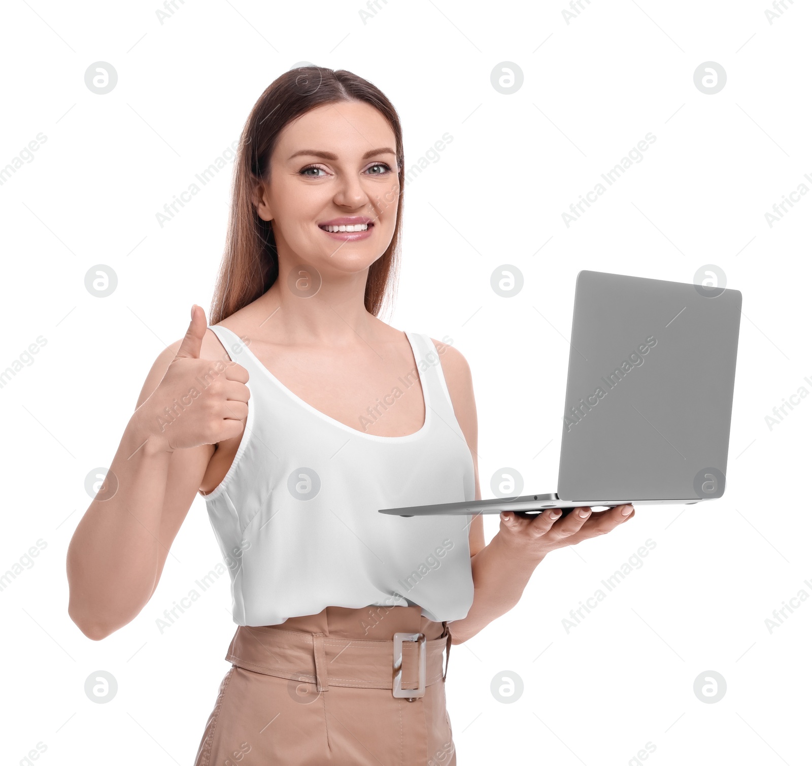 Photo of Beautiful happy businesswoman with laptop showing thumbs up on white background