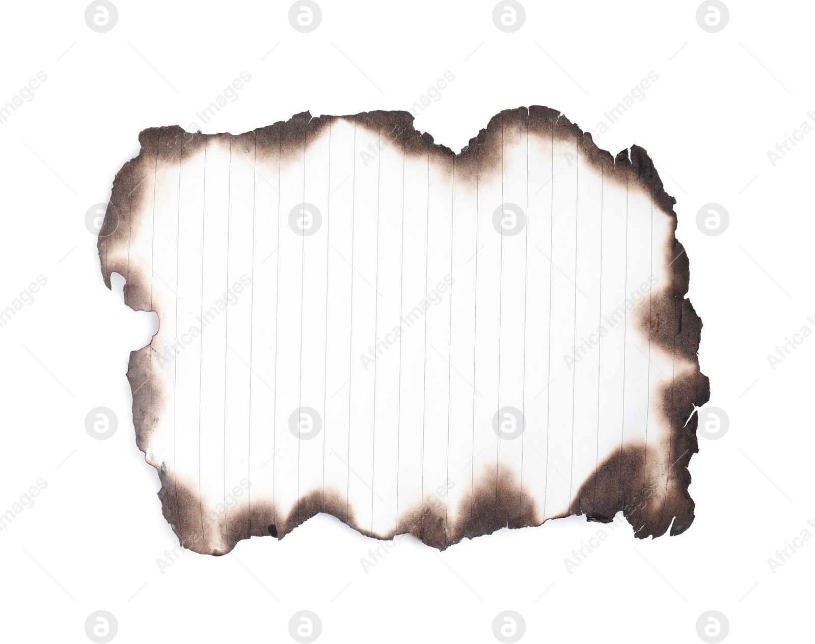 Photo of Piece of notebook paper with dark burnt borders on white background, top view. Space for text