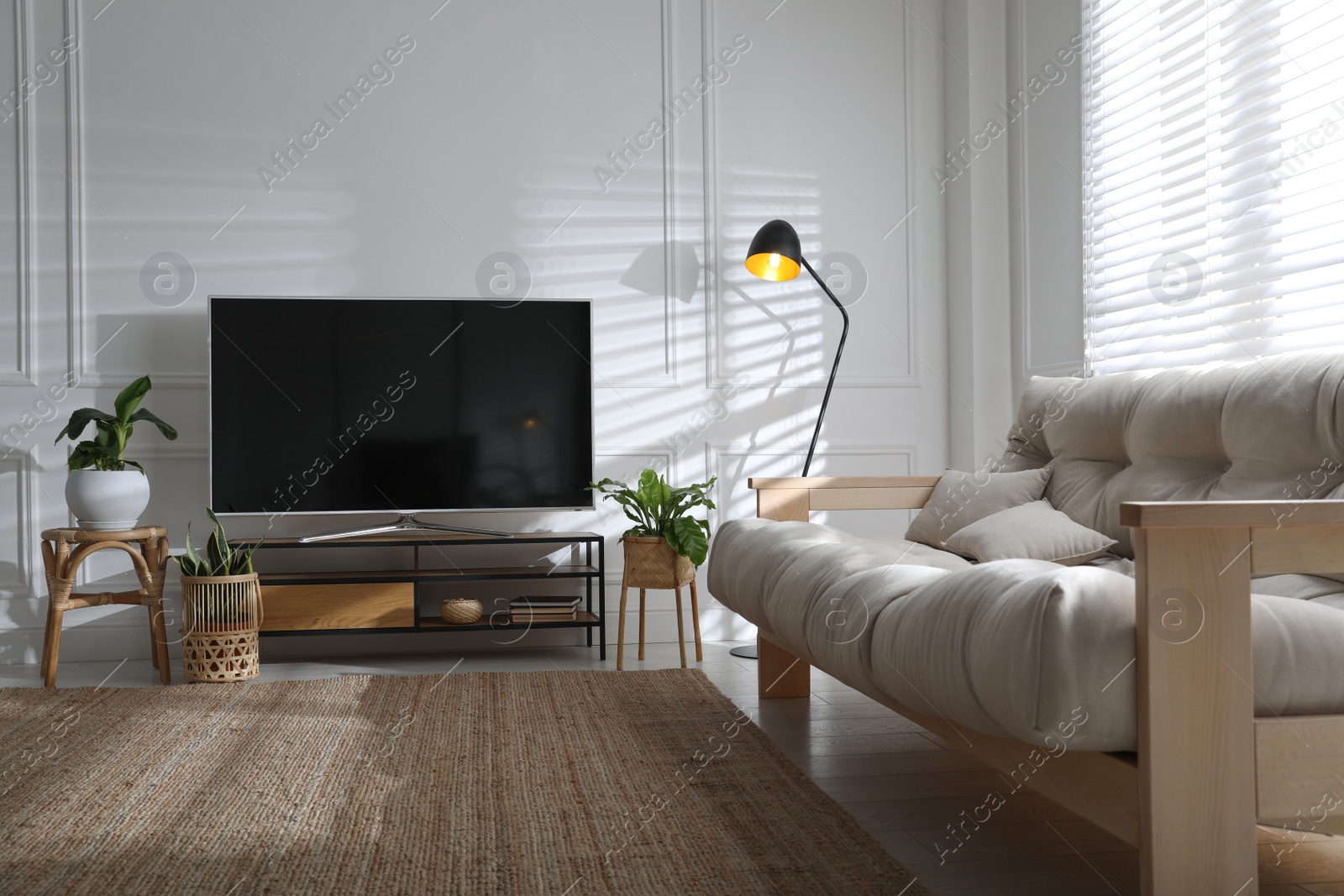 Photo of Living room interior with modern TV on stand