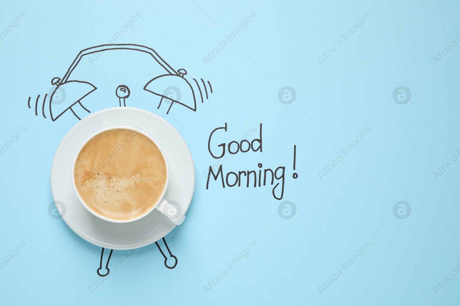 Photo of Composition with Good Morning wish and aromatic coffee on light blue background, top view. Space for text