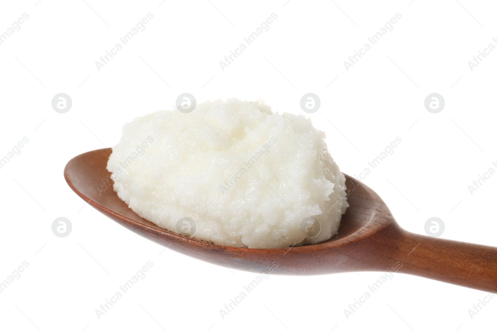 Photo of Shea butter in wooden spoon isolated on white