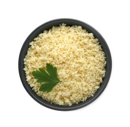 Tasty couscous with parsley on white background, top view