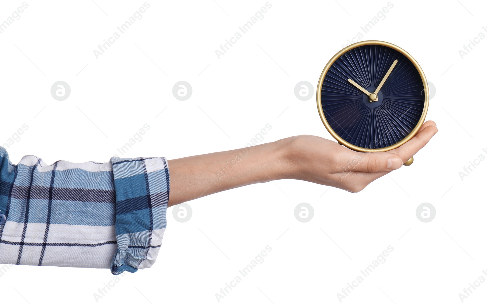 Photo of Young woman holding clock on white background. Time management