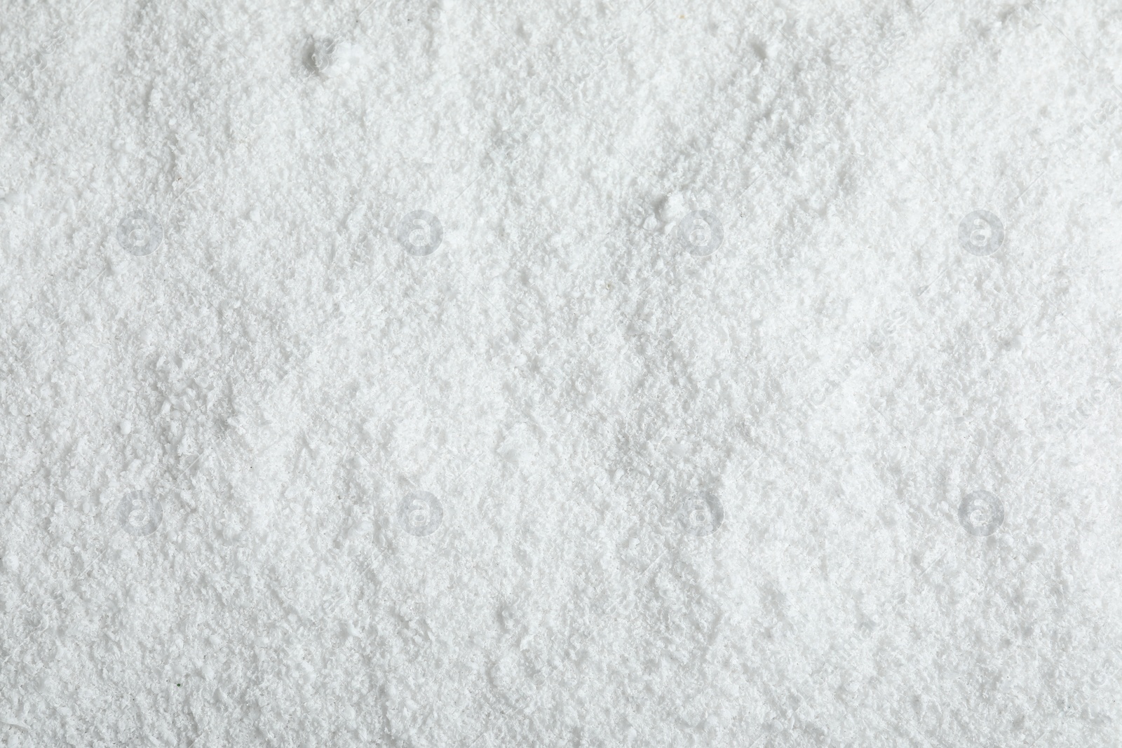 Photo of Pile of white snow as background, top view