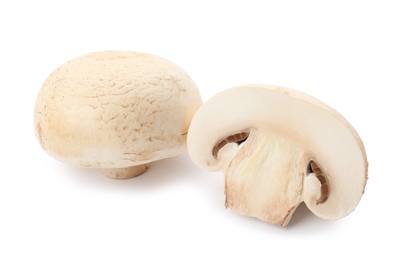 Photo of Fresh raw champignon mushrooms on white background