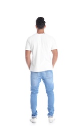 Photo of Young man in t-shirt on white background. Mockup for design