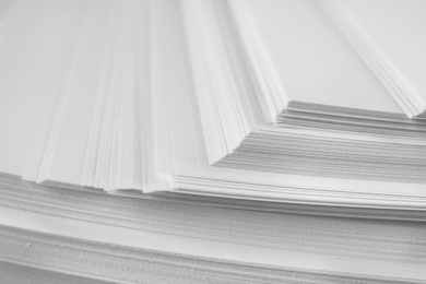 Photo of Stack of blank paper as background, closeup