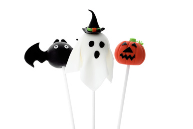 Delicious Halloween themed cake pops on white background