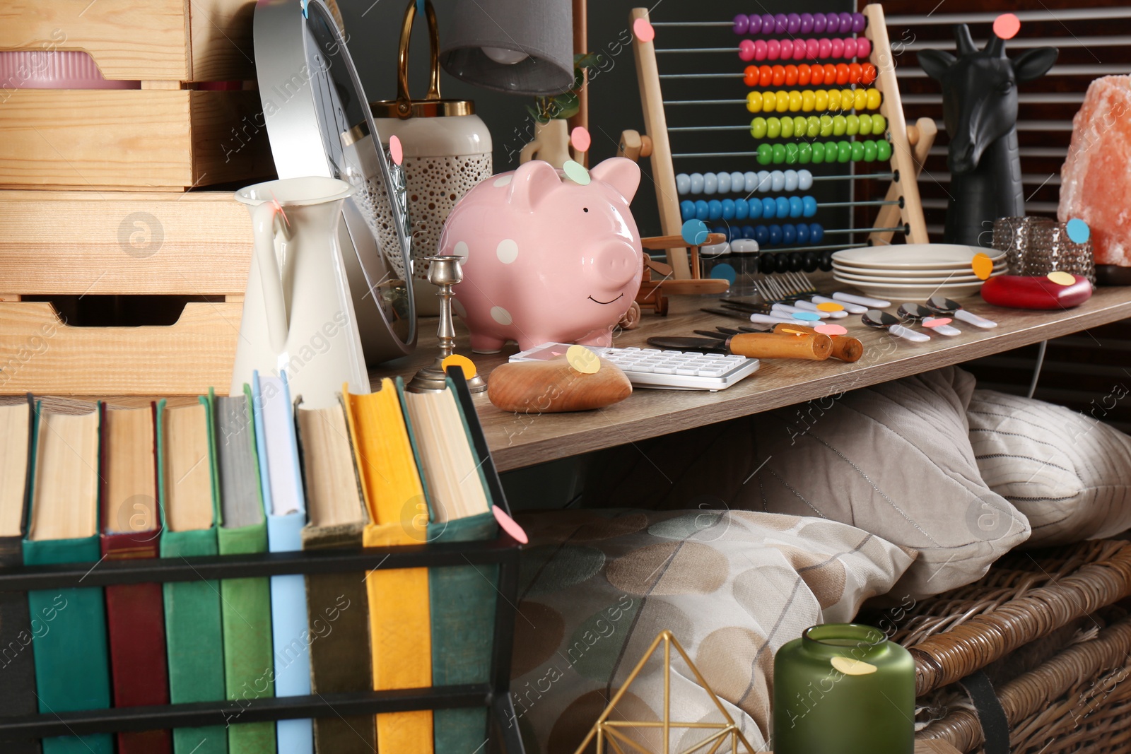 Photo of Many different stuff in room. Garage sale