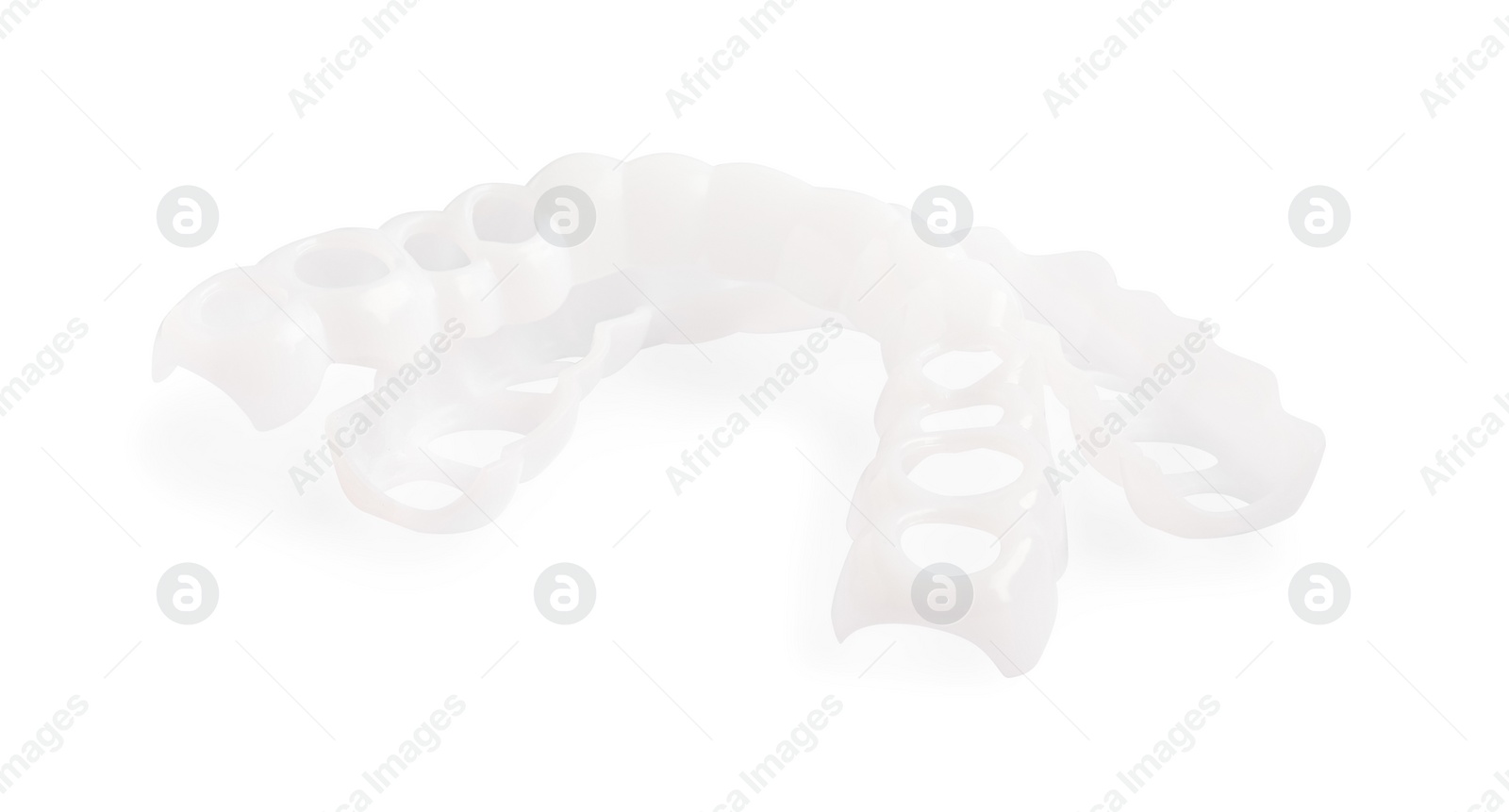 Photo of Dental mouth guards on white background. Bite correction