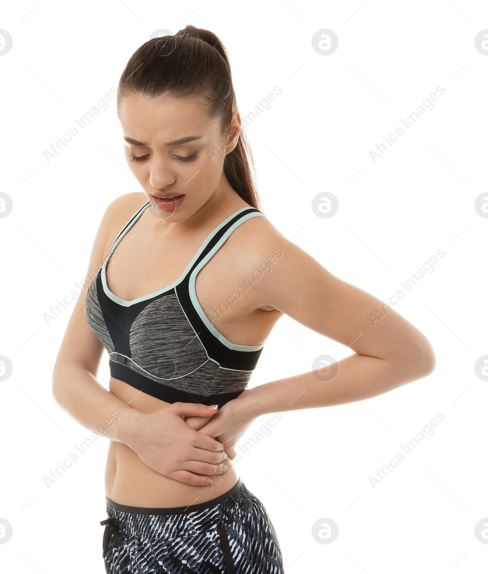 Photo of Young woman suffering from pain on white background