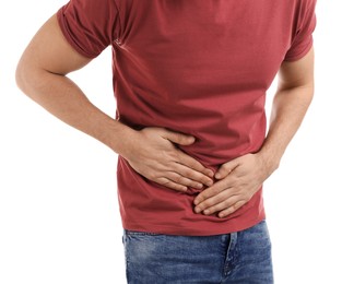 Photo of Man suffering from pain in lower right abdomen on white background, closeup. Acute appendicitis