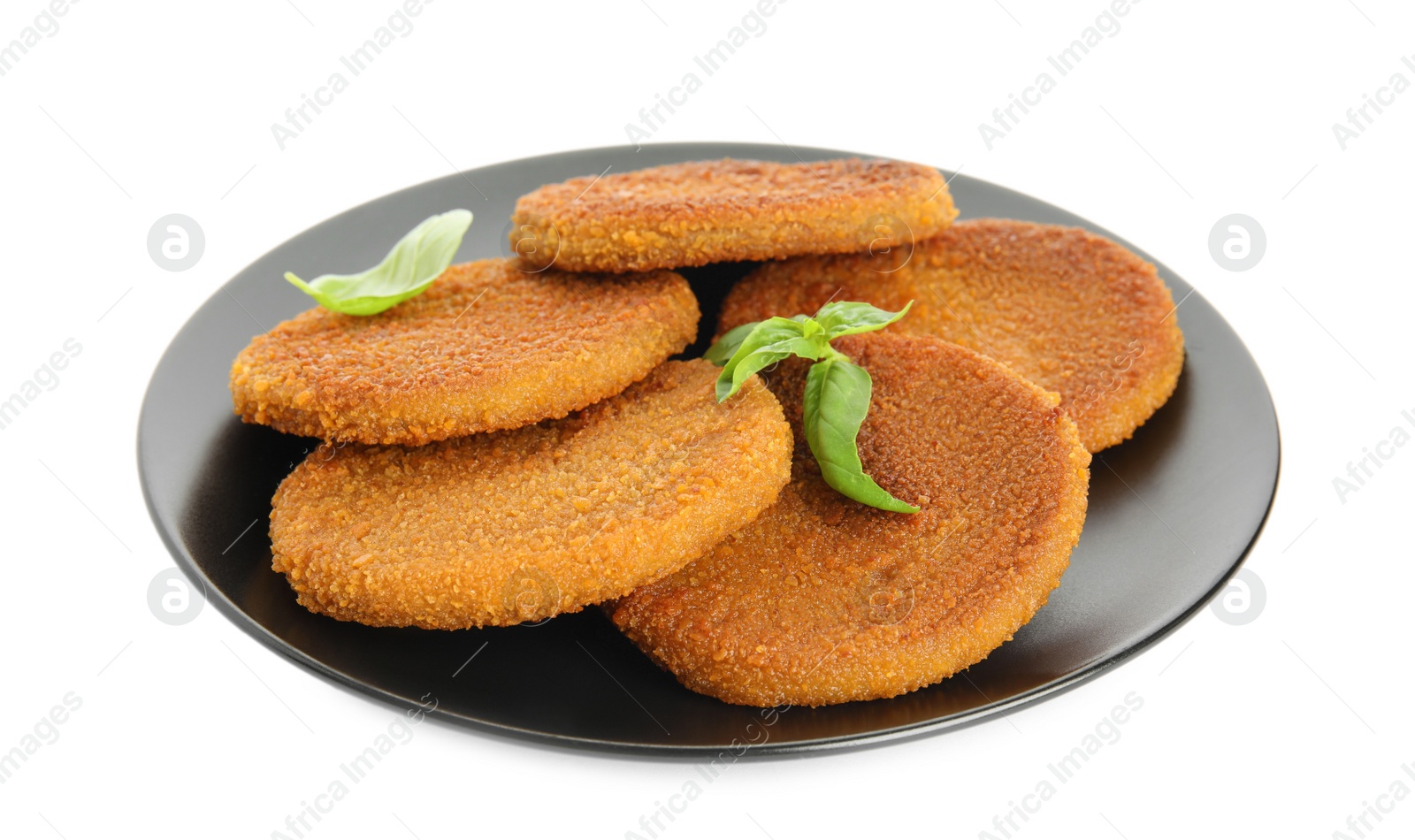 Photo of Delicious fried breaded cutlets with basil leaves isolated on white