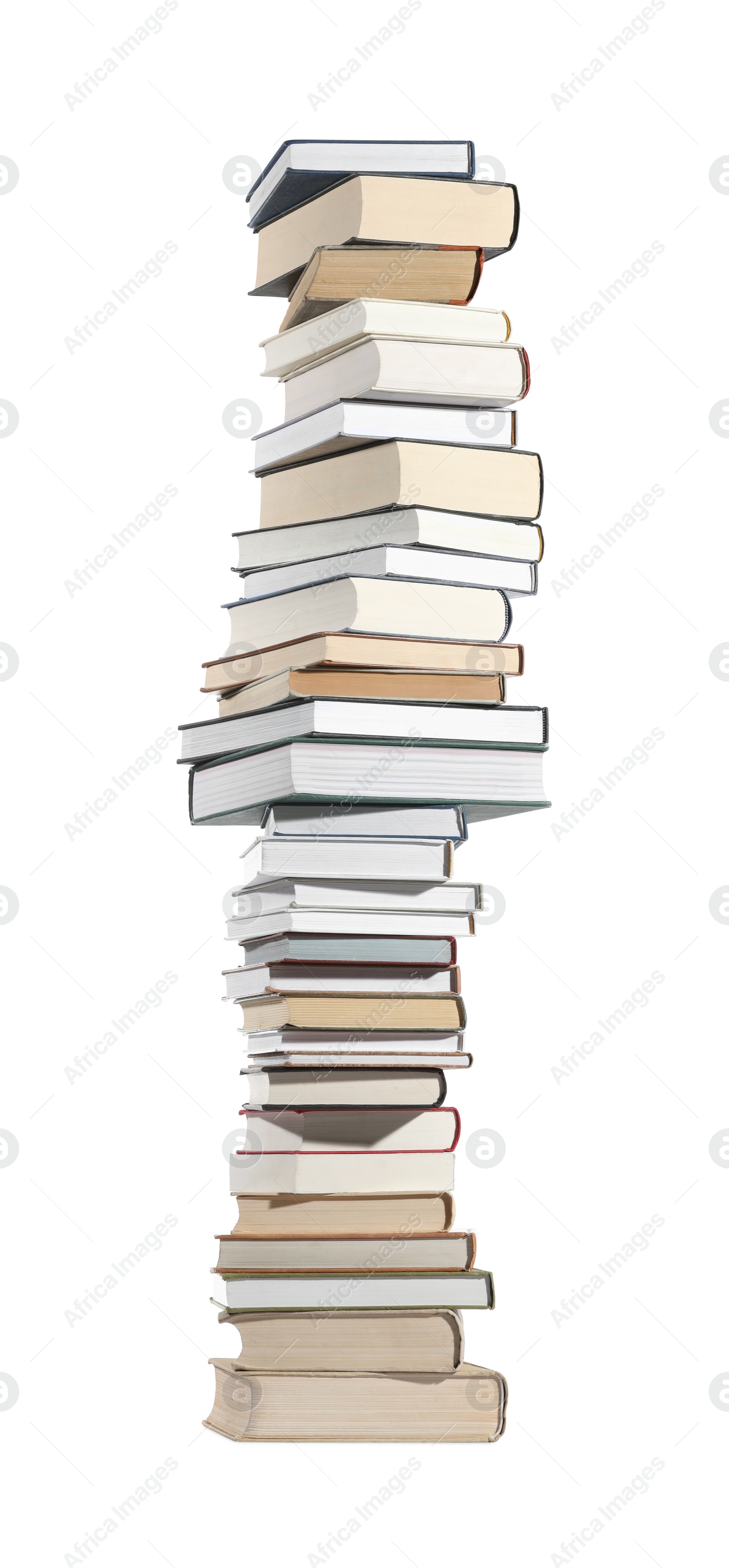 Photo of High stack of many different books isolated on white