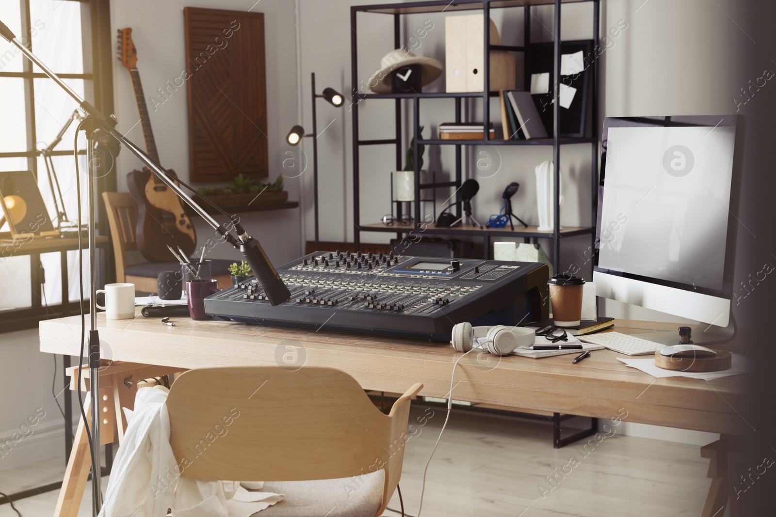 Photo of Professional audio equipment in modern radio studio