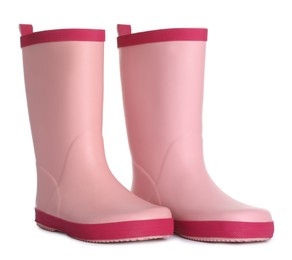 Modern pink rubber boots isolated on white