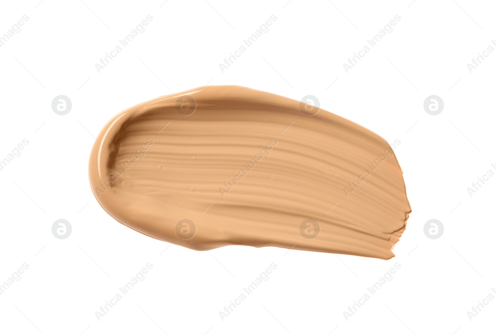 Photo of Smear of liquid skin foundation isolated on white, top view