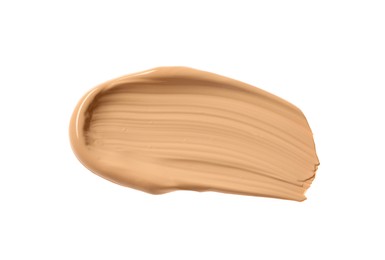 Smear of liquid skin foundation isolated on white, top view