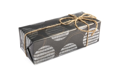 Beautiful gift box with twine on white background