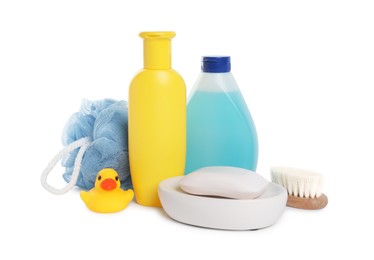 Baby cosmetic products, bath duck, brush and sponge isolated on white