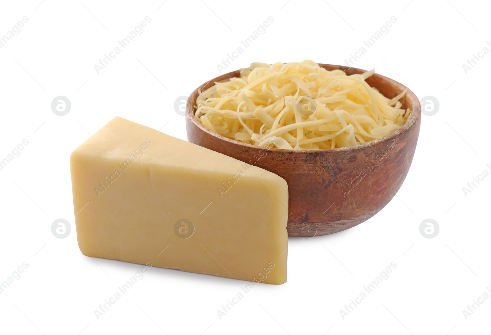 Photo of Grated and whole piece of cheese isolated on white