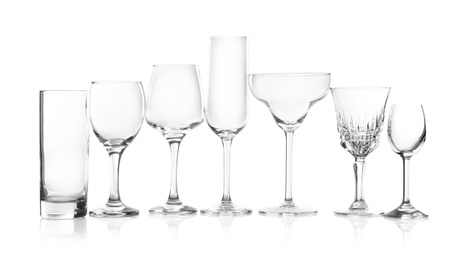 Set of new bar glassware on white background