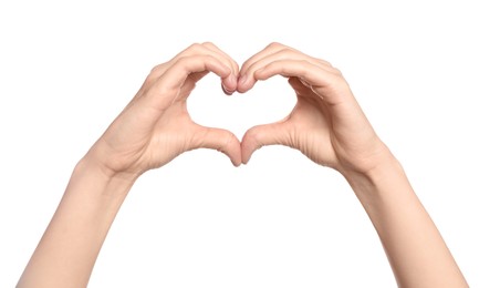 Photo of Woman showing heart on white background, closeuphands
