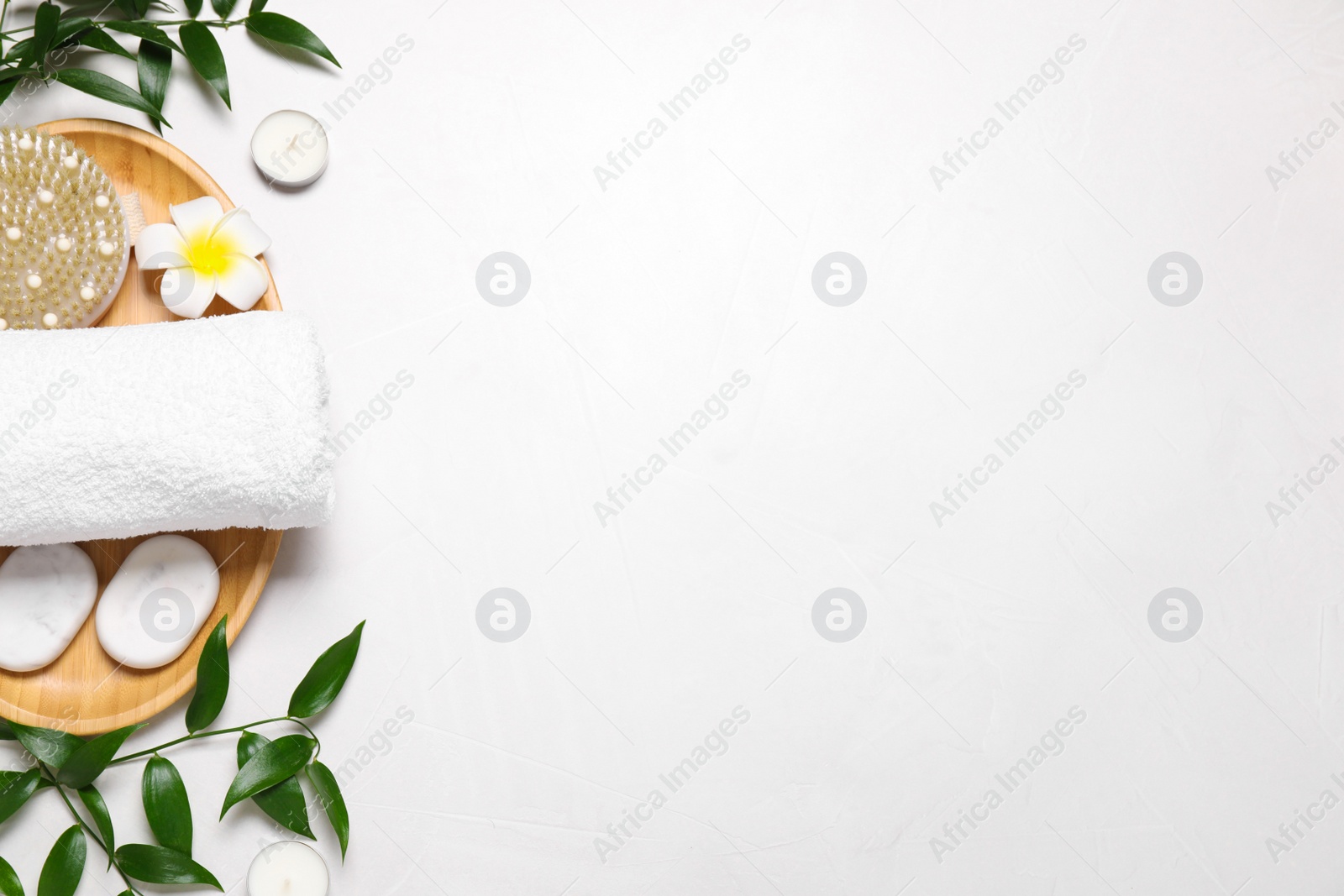 Photo of Flat lay composition with spa products on white table. Space for text