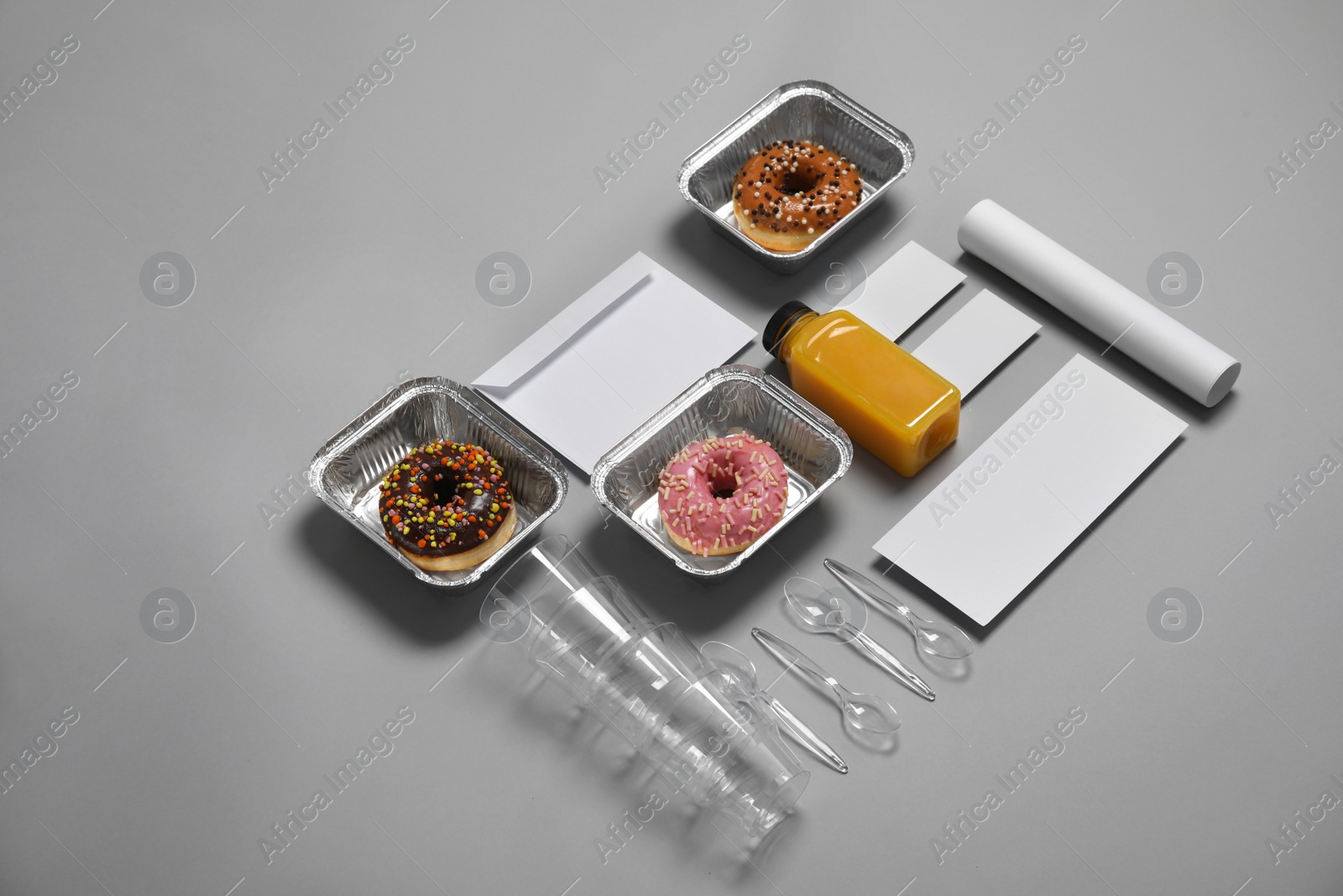 Photo of Composition with items for mock up design on gray background. Food delivery service