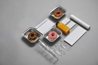 Photo of Composition with items for mock up design on gray background. Food delivery service