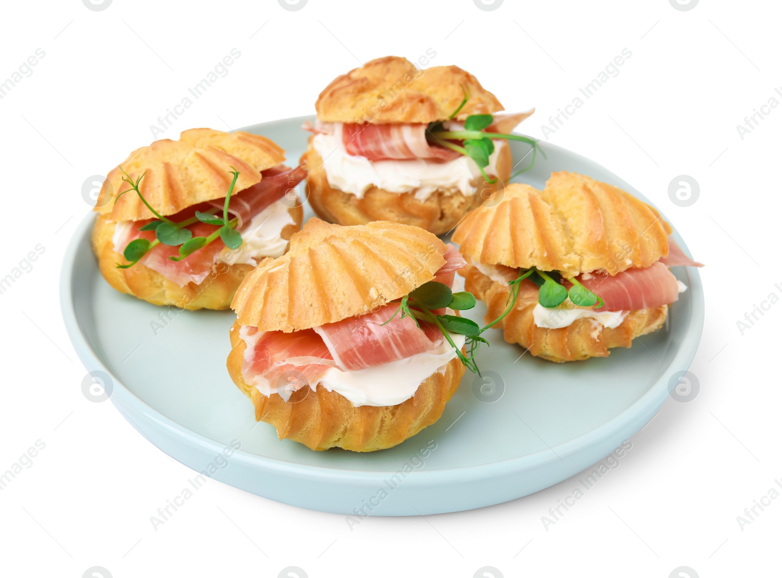 Photo of Delicious profiteroles with cream cheese and prosciutto isolated on white