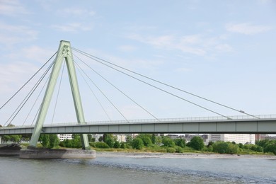 Photo of Picturesque view of a modern bridge over river