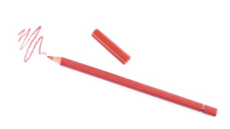 Photo of Bright lip liner stroke and pencil on white background, top view