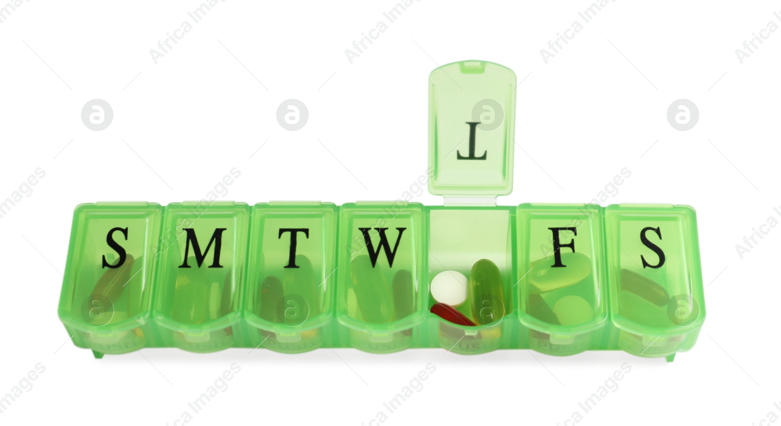 Photo of Different pills in organizer isolated on white