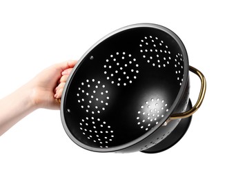 Woman with black colander on white background, closeup