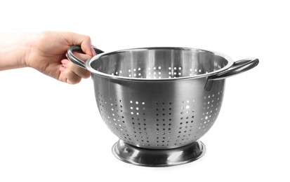 Woman with metal colander on white background, closeup