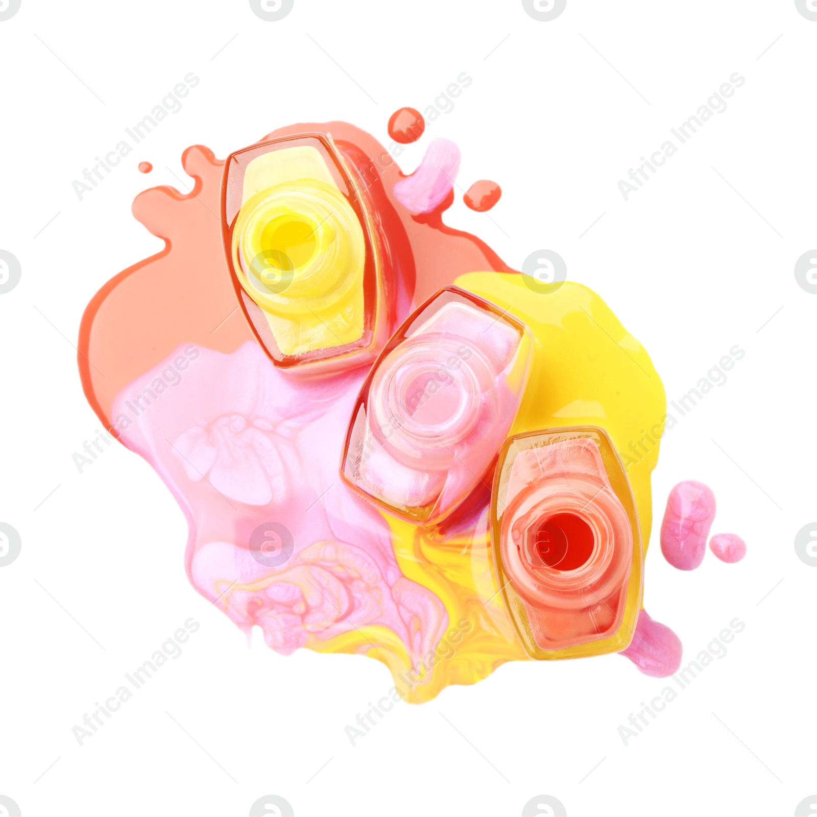 Photo of Puddle of different bright nail polishes and bottles on white background, flat lay. Space for text