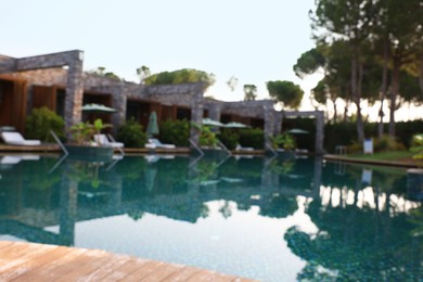 Photo of Outdoor swimming pool at resort, blurred view