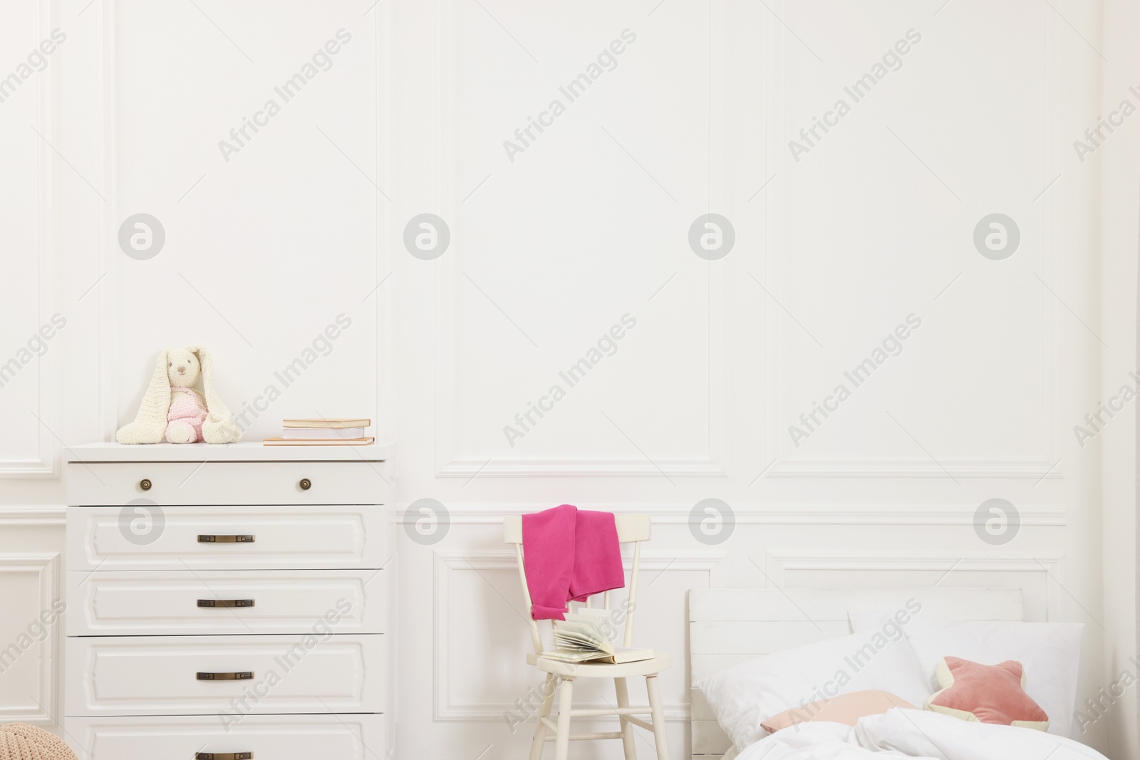 Photo of Cute child's room interior with modern furniture